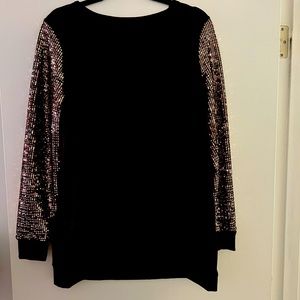 That Glam Girl dark brown sweater with sequined sleeves